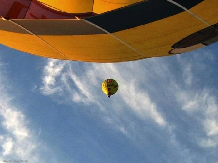 Soaring above in a hot air balloon